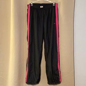 Women’s size large windbreaker pants.